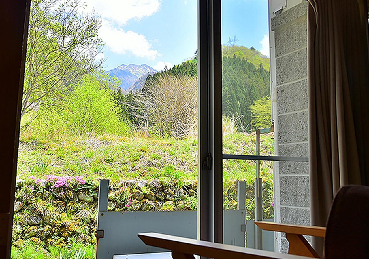 筋肉と自然と遊ぶ宿 田島館 Hotel Takayama  Bilik gambar